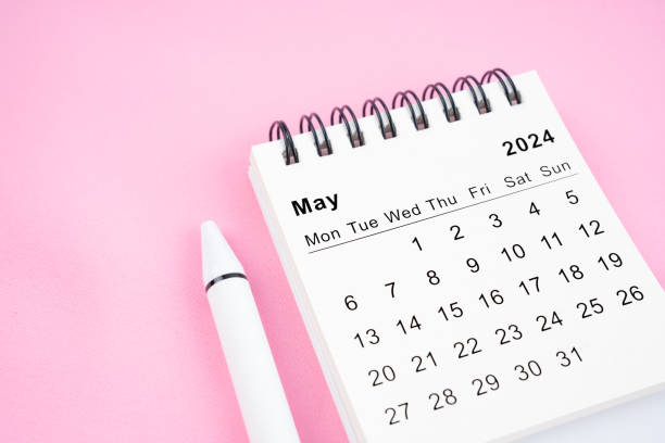 istock May 2024 month calendar on pink fabric background. 2149193282