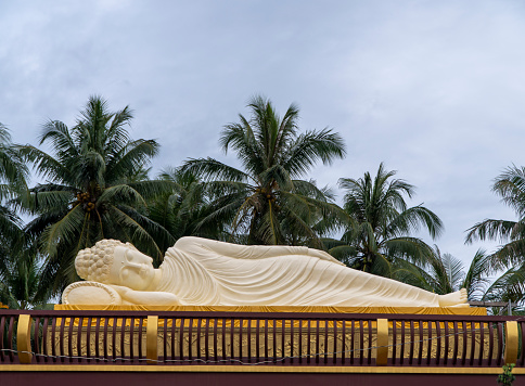 Giant reclining Buddha statue at Nam Hai mother pagoda, Tien Giang province