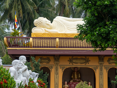 Giant reclining Buddha statue at Nam Hai mother pagoda, Tien Giang province