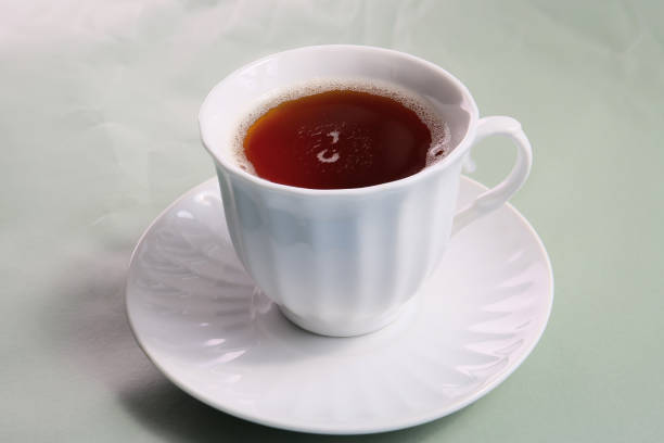 istock cup of black tea on a color background 2149196368