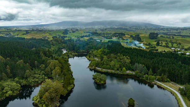 Drone perspective  of Lake Mangamahoe Taranaki  surrounded by forest