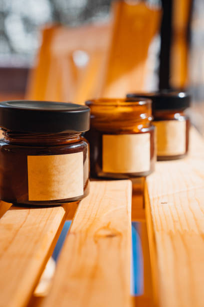 istock Scented candles on a wooden table. 2149203893