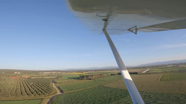 Flying with an ultralight plane over the lands of Alt Empordà