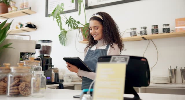 Woman, cafe and barista with order on tablet for sale, ecommerce and service at coffee shop. Female person, networking and waitress with technology for website, communication or online menu update