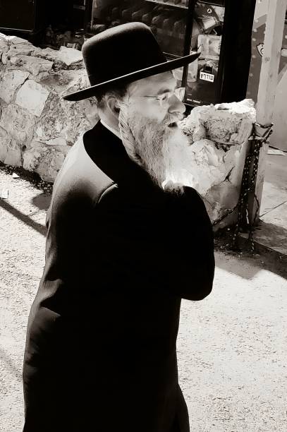 Jerusalem, Israel- July 20 2024: A group of young religious men on a Saturday promenade in Jerusalem.