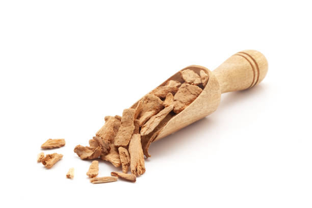 istock A wooden scoop filled with Organic Lodhra Bark (Symplocos racemosa). 2149209399