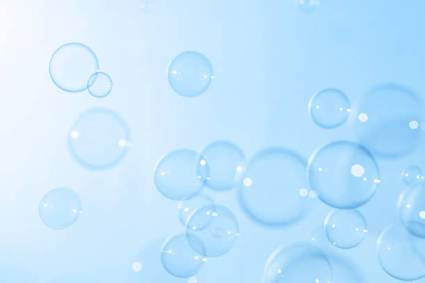 istock Beautiful Transparent Soap Bubbles Floating in The Air. Celebration Festive Backdrop. Freshness Soap Suds Bubbles Water. Abstract Blue Textured Background. 2149209799