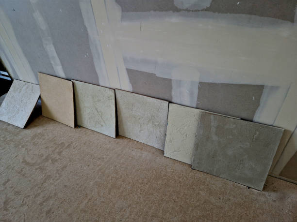 the choice of plaster on a piece of board is painted the desired shade to match the sample. residential and office designer the choice of plaster on a piece of board is painted the desired shade to match the sample. residential and office designer, after, pigment, ral, painted drywall texture stock pictures, royalty-free photos & images