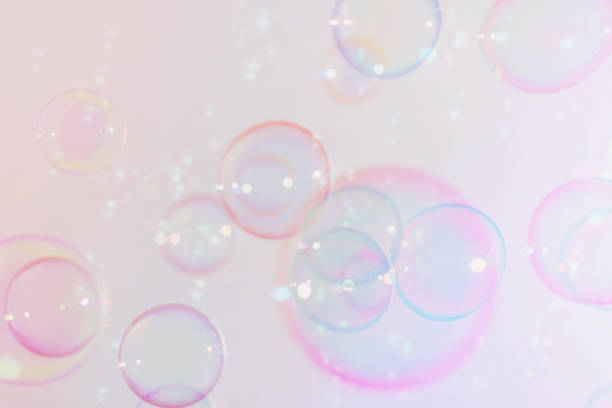 istock Beautiful Transparent Shiny Soap Bubbles Background. Celebration Festive Backdrop. Pink Textured. Freshness Soap Suds Bubbles Water. 2149210120