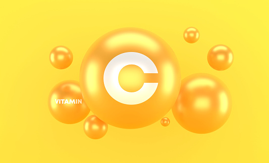 Vitamin C Concept On Orange Background