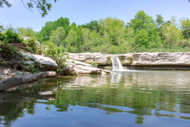 istock Waterfall and mountain cedar forest rock view in McKinney Falls State Park Austin Texas 2149210656