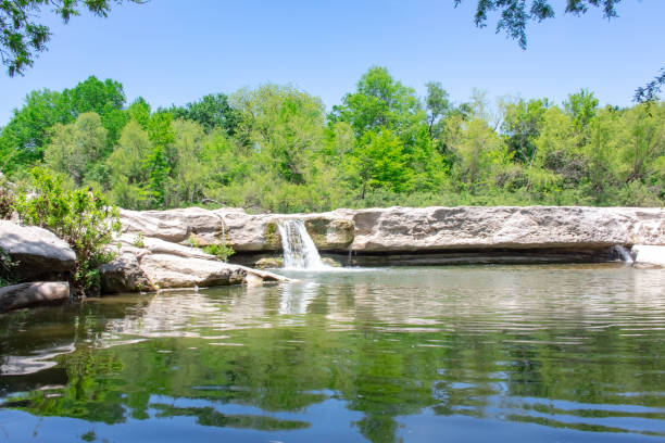 istock Waterfall and mountain cedar forest rock view in McKinney Falls State Park Austin Texas 2149210660