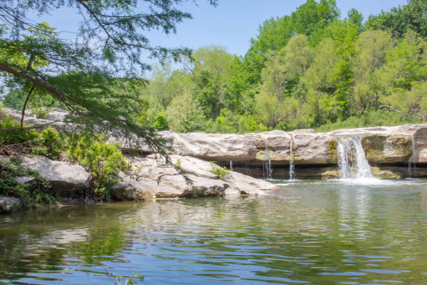 istock Waterfall and mountain cedar forest rock view in McKinney Falls State Park Austin Texas 2149210699