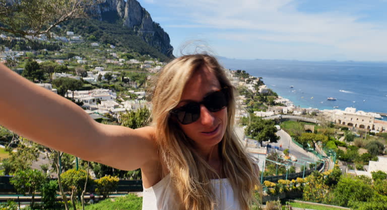 A Beautiful Woman Taking A Selfie On The Island Of Capri in Southern Italy