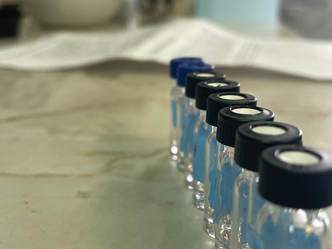 a number of special glass jars for analysis and calibration curve in the toxicology laboratory
