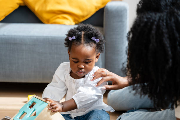 istock Toddler learning with alphabet toy at home 2149212756
