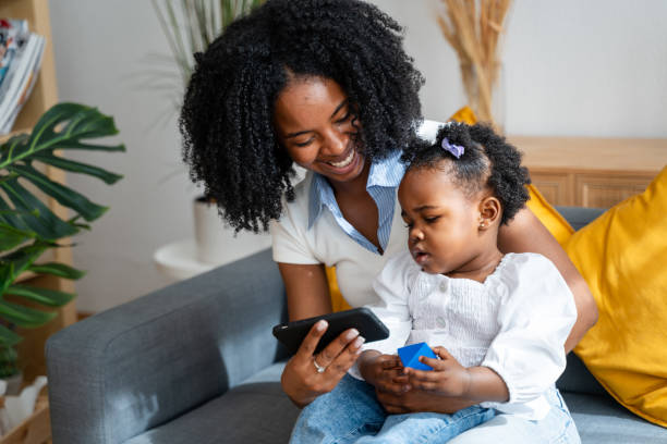istock Mother and toddler enjoying technology together 2149212827