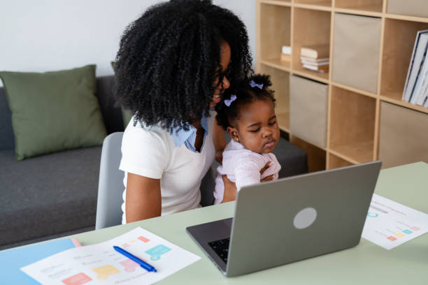 istock Young mother working from home with toddler 2149213962
