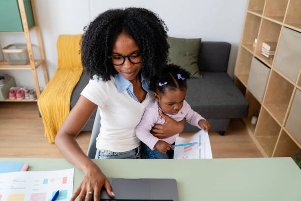 istock Young mother working from home with toddler 2149213987
