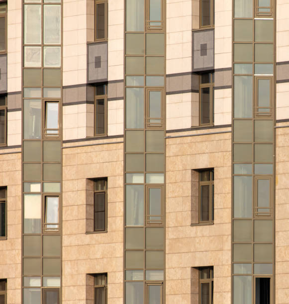 istock The walls of a multi-story building as a background. Texture 2149219969