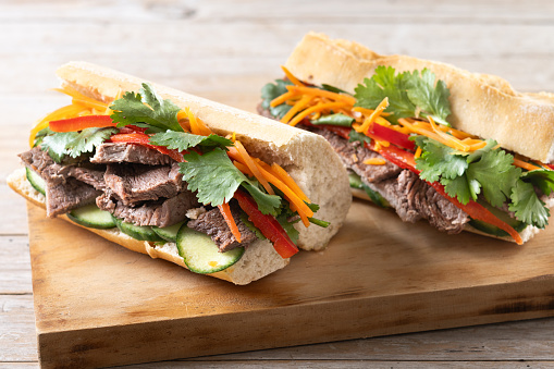 Vietnamese banh mi sandwich on wooden table