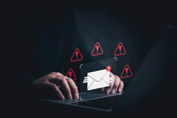 istock business cyber attack, with email hacker. alerts about potential viruses, scam, and spam emails. threat cyber crimes and messages technology 2149223201