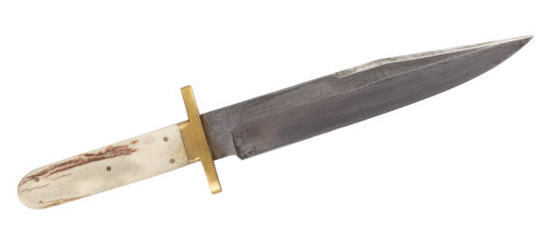 istock Old west bowie knife isolated on white 2149223980