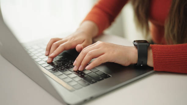 istock Young woman working on laptop. 2149224043