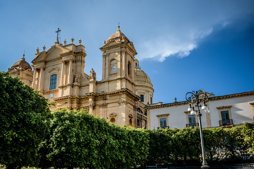 The Towers Of Majestic Noto Cathedral Seen From Park In Noto, Sicily