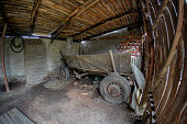 old horse cart in an abandoned barn in the countryside
