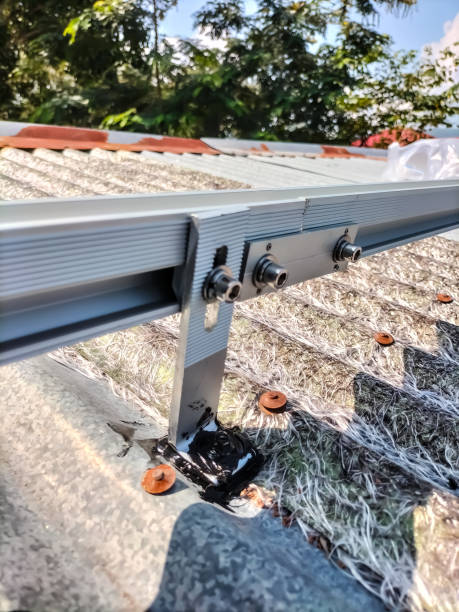 istock Installing a roof mounting kit for installing solar panels 2149230850