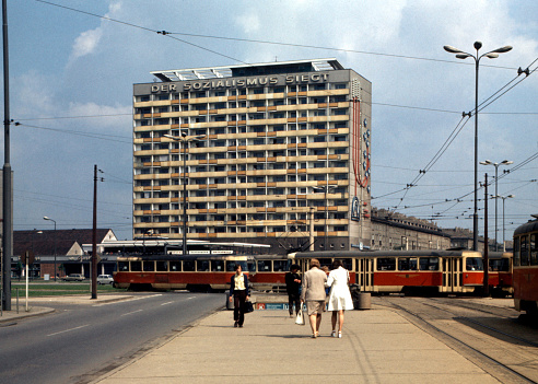 High-rise building on Pirnaischer Platz in Dresden's old town, built in prefabricated construction with the slogan Socialism wins on the facade - German Democratic Republic