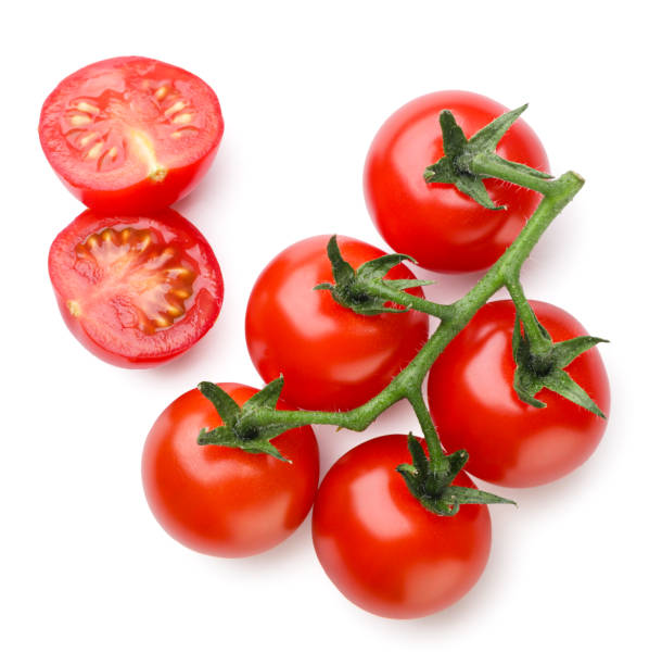istock Cherry tomatoes and halves close-up on a white background. Top view 2149233767