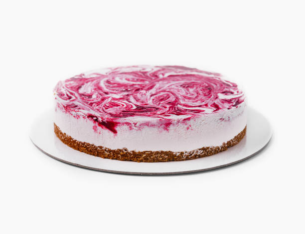 istock Fresh homemade raspberry swirl cheesecake on white 2149234580