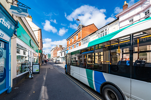 Tiverton, UK. 18 April 2024. Bus travel in Tiverton on the high street.