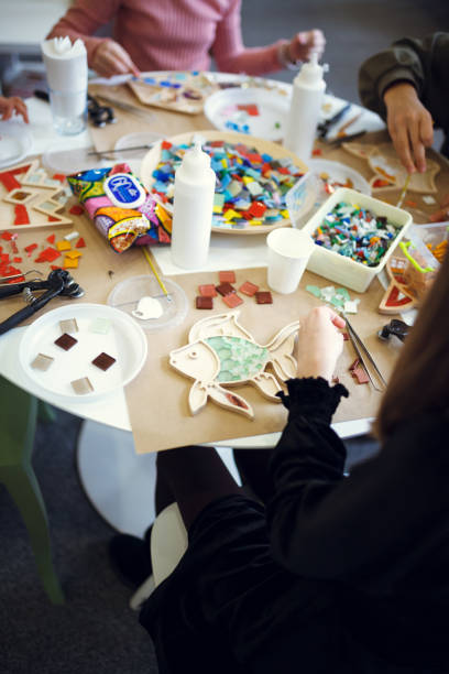 istock The process of creating a fish-shaped mosaic. 2149238243