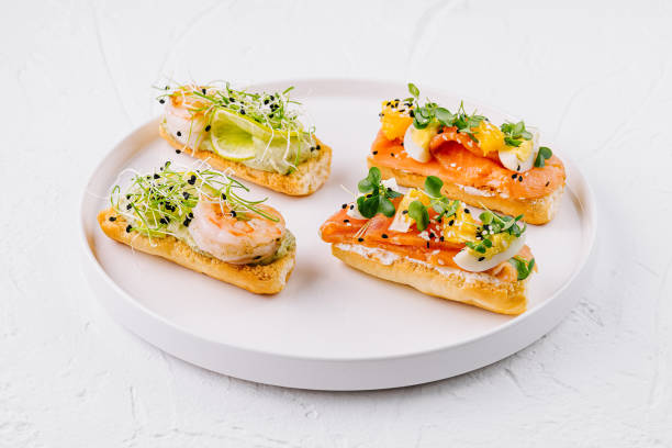 istock Gourmet bruschetta platter on white background 2149239355