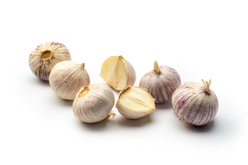 Asian Garlic, one sliced  Isolated on White Background, high angle view, studio shot.