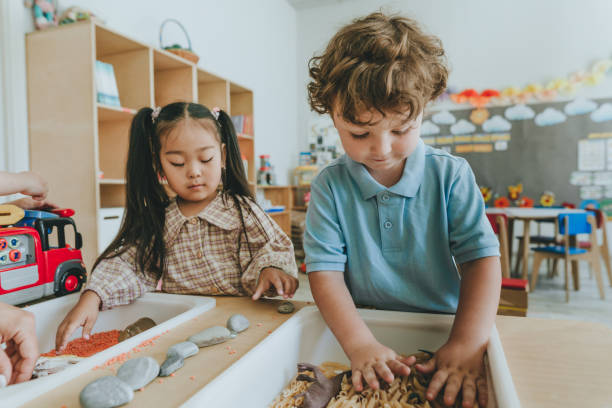 istock Children playing with toy figures in bulk cereals and pasta in kindergarten 2149241108