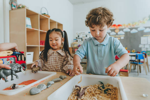 istock Children playing with toy figures in bulk cereals and pasta in kindergarten 2149241126