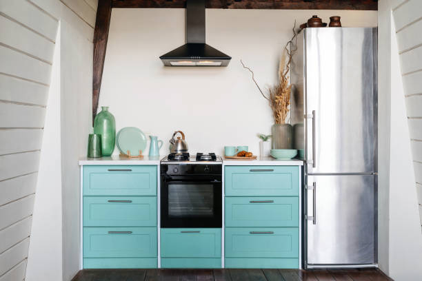istock Cozy small kitchen with modern appliances in house 2149241769