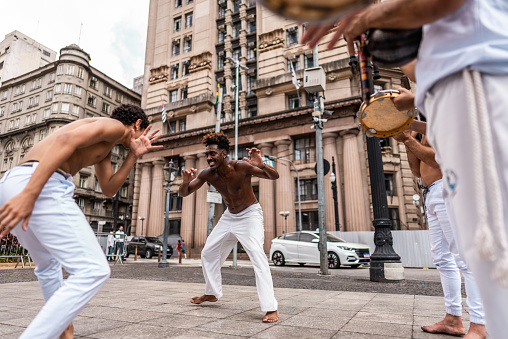 Capoeiristas playing capoeira in São Paulo, Brazil