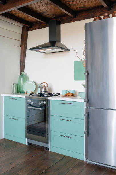 istock Cozy interior at home kitchen, blue cupboards and gas stove with oven 2149241773