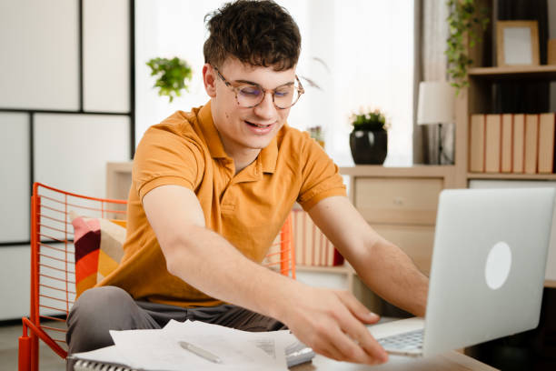 istock One young men working or studying at home, making a video call, video conference 2149242826