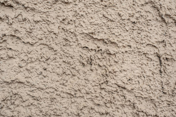 istock rough plaster at the facade of a building 2149243070