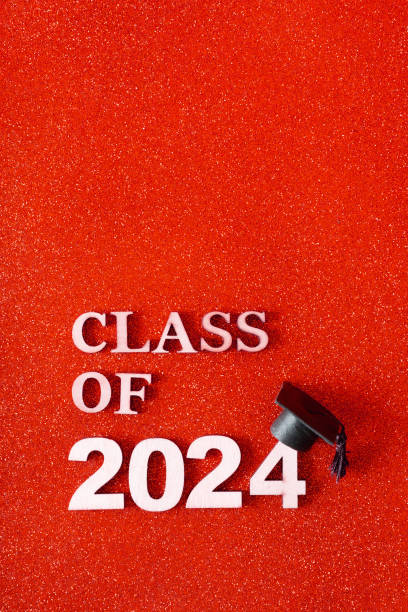 istock Class of 2024 text with graduation cap on glitter background. Graduation holiday concept. 2149245793
