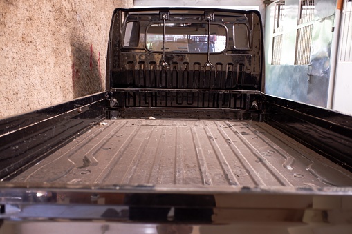 Black pickup truck rear bed, vehicle, stock photo.