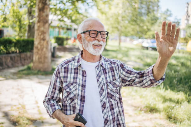 istock Smiling senior old man enjoying outdoors in nice weather. 2149246117