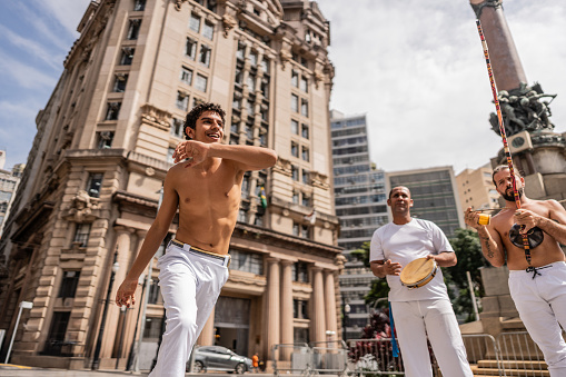 Capoeiristas playing capoeira in Sao Paulo, Brazil