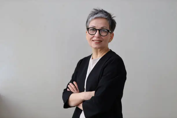 A successful and elegant businesswoman, radiating confidence and happiness, embodies beauty and professionalism. A successful and elegant businesswoman, radiating confidence and happiness, embodies beauty and professionalism.